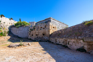 Panorama of old town, famous Knights Grand Master Palace and Mandraki port, Rhodes island, Greece.