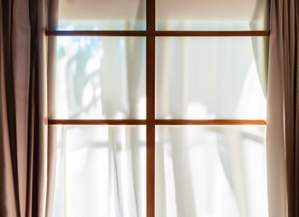 window and  white sheer curtains