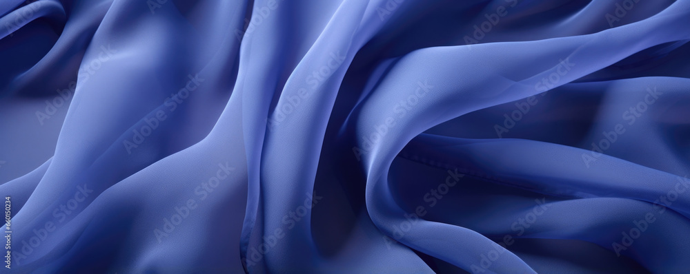 Poster texture of a royal blue chiffon fabric with a slightly rough and tactile texture, adding depth and i