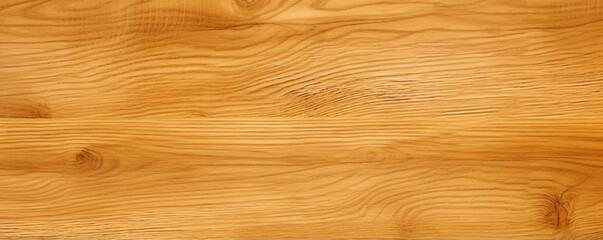 Texture of a golden medium wood with a warm, golden hue, evoking a sense of coziness and comfort....