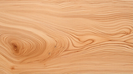 Closeup of light peachcolored wood with dark grain lines in swirled and intricate patterns. The wood has a delicate and feminine look, while the dark grain lines add depth and complexity