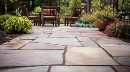 Zelfklevend Fotobehang The surface of this weathered flagstone patio is reminiscent of a wellloved garden path, with a combination of smooth and rough stones in earthy hues. © Justlight