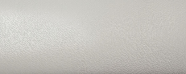 Texture of a light grey Harness Leather, showing off a modern and sleek aesthetic. The leather has a smooth and uniform surface, with a subtle shine and fine texture. - obrazy, fototapety, plakaty