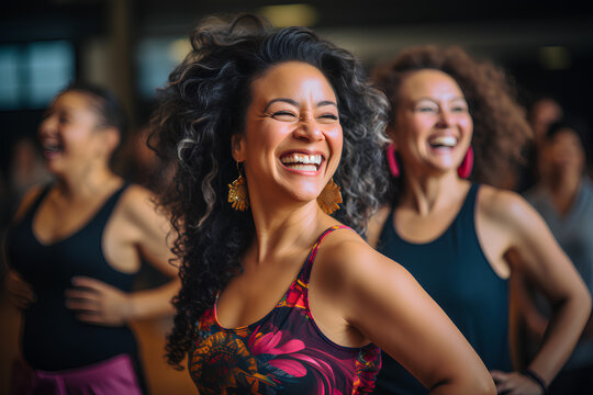 Middle-aged Women Enjoying A Joyful Dance Class, Candidly Expressing Their Active Lifestyle Through Zumba With Friends