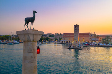 Mandraki port with deers statue, where The Colossus was standing and fort of St. Nicholas. Rhodes,...
