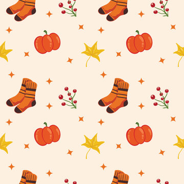 seamless pattern with pumpkins and socks 