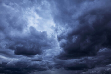 Naklejka na ściany i meble Storm clouds, sky, epic blue dark clouds background texture, thunderstorm