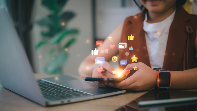 Social media and digital online concept, man using smart phone with Social media. The concept of living on vacation and playing social media. Social Distancing ,Working From Home concept.