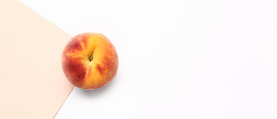 Sweet peach on light background with space for text, top view