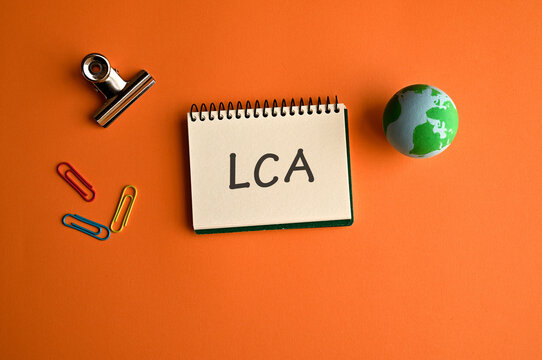 There is notebook with the word LCA. It is an abbreviation for Life Cycle Assessment as eye-catching image.