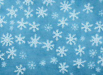 Artistic snowflakes on a light blue background
