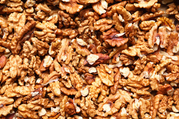 Shelled walnuts as background, closeup