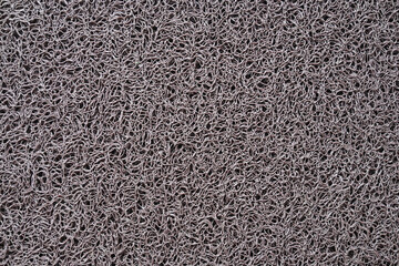 abstract background of a doormat motif texture with holes and twists. Unique abstract for design.