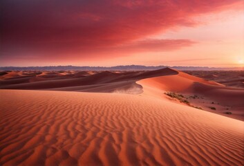 Fototapeta na wymiar A vast desert landscape with rolling sand dunes under a crimson sunset