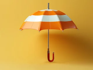 Fotobehang orange white striped umbrella on yellow background copy space. autumn abstract background © Margo_Alexa