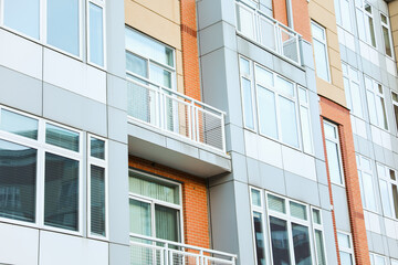 modern cityscape at dusk, featuring illuminated skyscrapers reflecting in calm waters, epitomizing urban progress and innovation