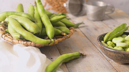 Fresh and raw green broad beans