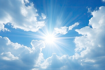 Naklejka na ściany i meble Sun rays piercing through fluffy clouds in the bright blue sky