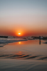 sunset in the Canggu beach,silhouette of unrecognizable person