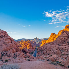 Iconic Road through Valley of Fire Landscape Scenery with a bright blue sky in the Nevada Desert near Las Vegas.