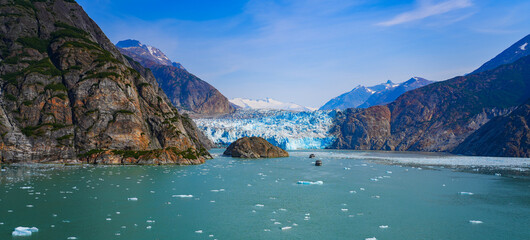 Panoramic view of South Sawyer Glacier at the end of Tracy Arm Fjord in southeast Alaska, USA -...