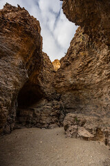 Sand Covers The Floor Of The Large Cavern At The End of Upper Burro Mesa Pouroff In Big Bend
