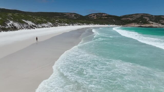 Hellfire bay - person walking along the beach - pristine white sand - australia
