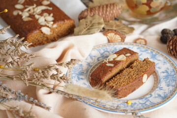 Decadent Black and Brown Brownies with a Generous Almond Topping - Irresistible Dessert Temptation