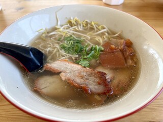 a high angle shot of a chinese ramen soup