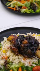 Delicious Grilled Ribs with Butter Rice and Vegetables