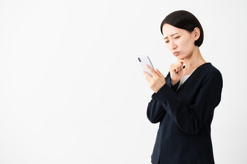 Fototapeta premium ビジネススーツを着ている若い女性 ビジネスイメージ