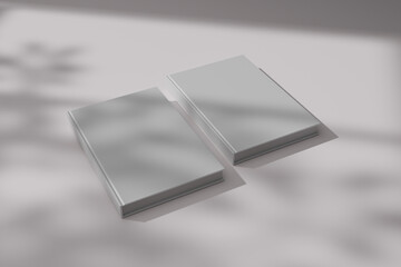3d rendering of blank white book with window shadow and tree branches, for mockup design