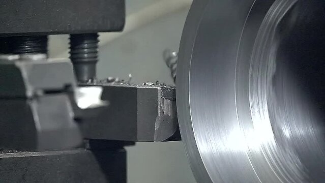 Close-up lathe cutting a steel slow motion