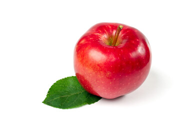 Red apple on a white background. An apple of the Kandil Sinap variety. Natural organic apple close-up.