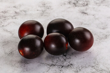 Raw ripe black kumato tomato