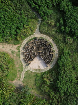 Aerial view of Laomei maze in Taiwan. Top down view by drone in Shimen district, New Taipei City, North Taiwan. A famous attraction nearby Laomei green reef.