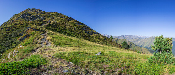 couple ascending the path, Montcorbison, Aran Valley, Lérida province, Spain