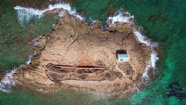 Aerial View Of A Cute Little Island With A Little Chapel. City Of Malia In Crete