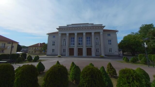 The Palace of Culture and the sculpture of a worker in Naujoji Akmene, Lithuania. Hyperlapse Footage.