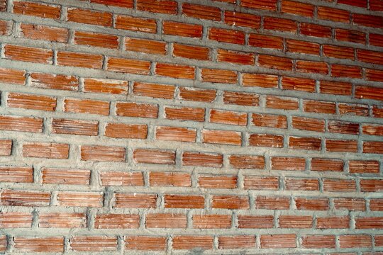brick block wall. Texture of old dark brown and red brick wall floor background pattern construction, high quality photo full frame camera.