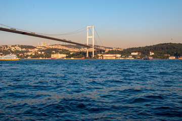 Istanbul Bosphorus Bridge or 15 July Martyrs Bridge on a sunny summer day with the deep blue sea