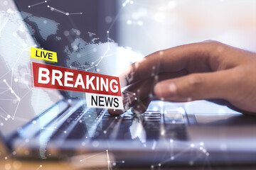 Close up of male hands using laptop with creative polygonal hi-tech breaking news hologram on blurry background. Television, online news and digital communication concept. Double exposure.