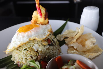 indonesian food,fried rice with sunny side egg and chicken satai