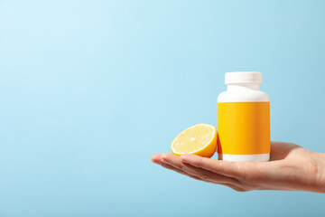 Vitamin C in a bottle in the form of tablets.