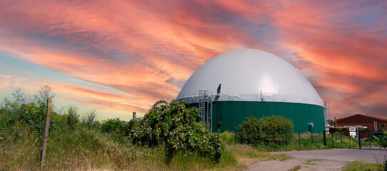 panorama biogas production, biogas plant, bio power	
with sunset