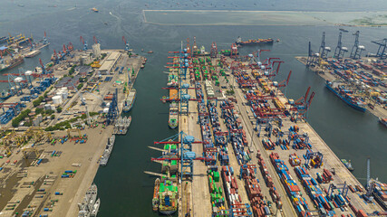 Container terminal with cargo ships. Tanjung Priok sea port. Indonesia.