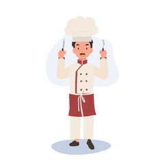 Adorable Child Chef Holding Fork and Knife. Young Chef in Chef Hat  with Fork and Knife