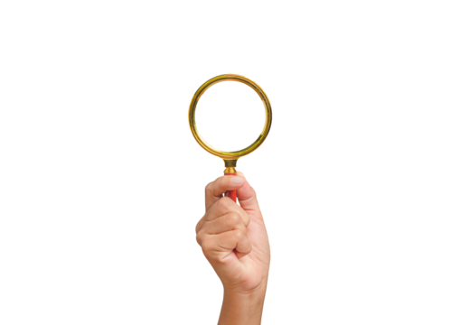 Close-up of hand holding a magnifying glass against a transparent background.
