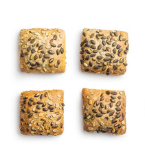 Whole grain bun with pumpkin seeds isolated on white background.