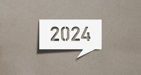 2024 New Year greeting card. Simple, clean design with cut paper on a brown background. Business and company sign, tranquility, ecology, elegance with copy space.